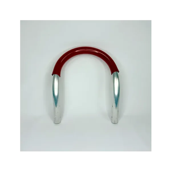 Metal handtruck handle with red grip.