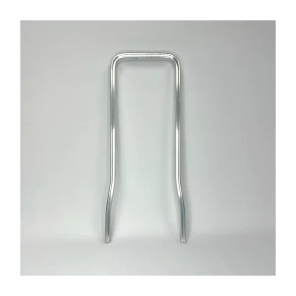 U-shaped metal wire frame with a rounded top and two legs standing on a white surface